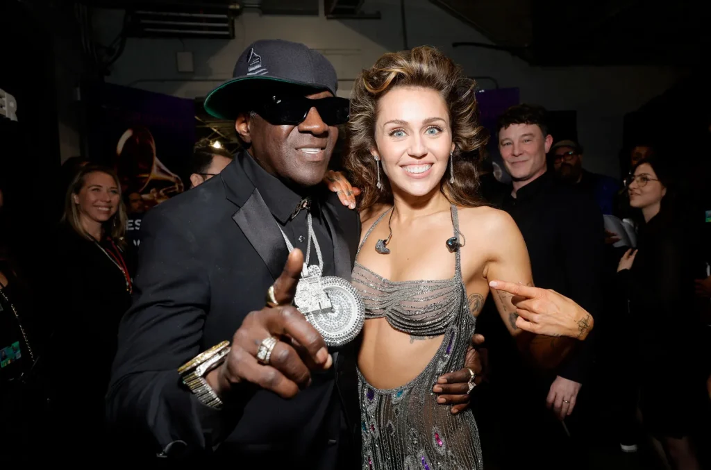 Miley Cyrus and Flavor Flav